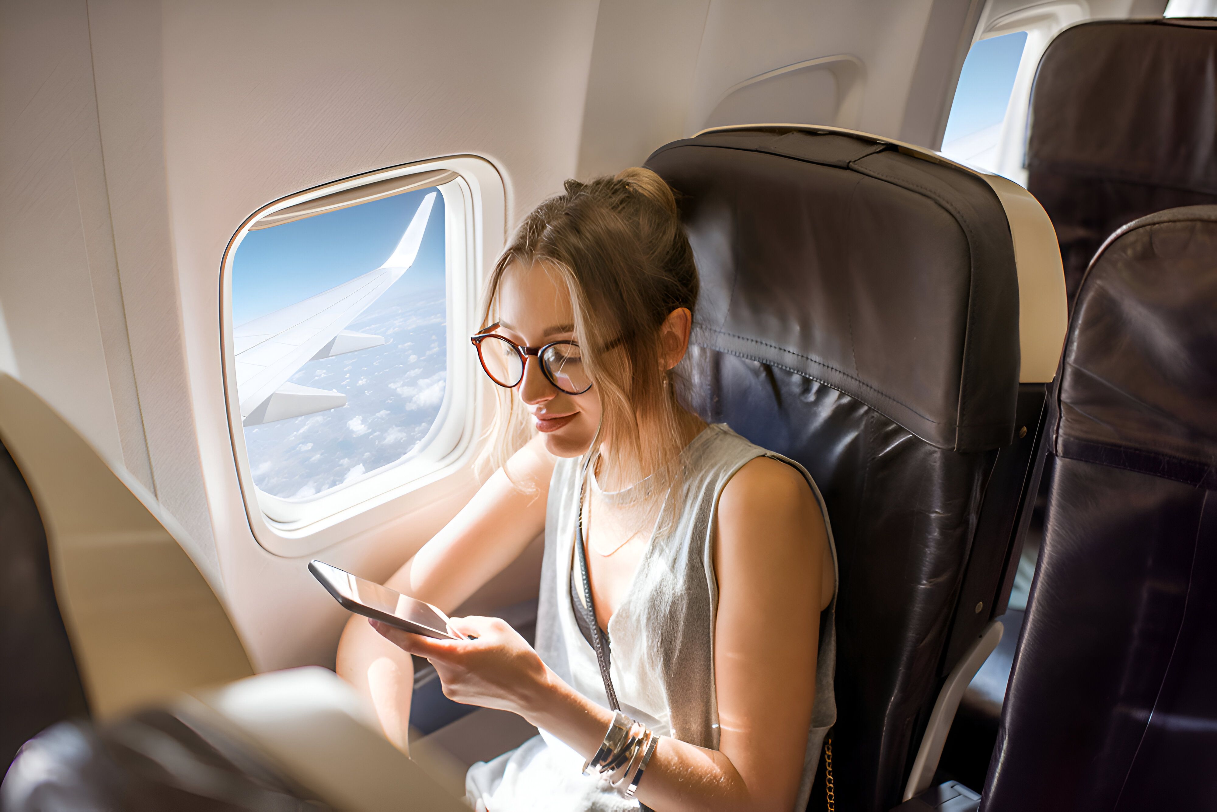 Tourist on the plane searching esim glossary 